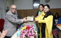 Ms. Hemlata Kheria and Ms. Laldingliani Sailo presenting the momento to Shri T. Chatterjee, Chairman, IIPA